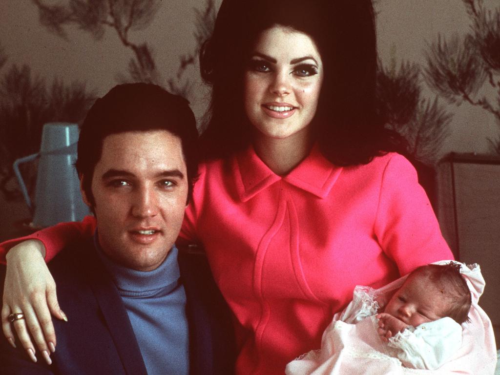 Elvis Presley poses with wife Priscilla and daughter Lisa Marie. Picture: AP Photo