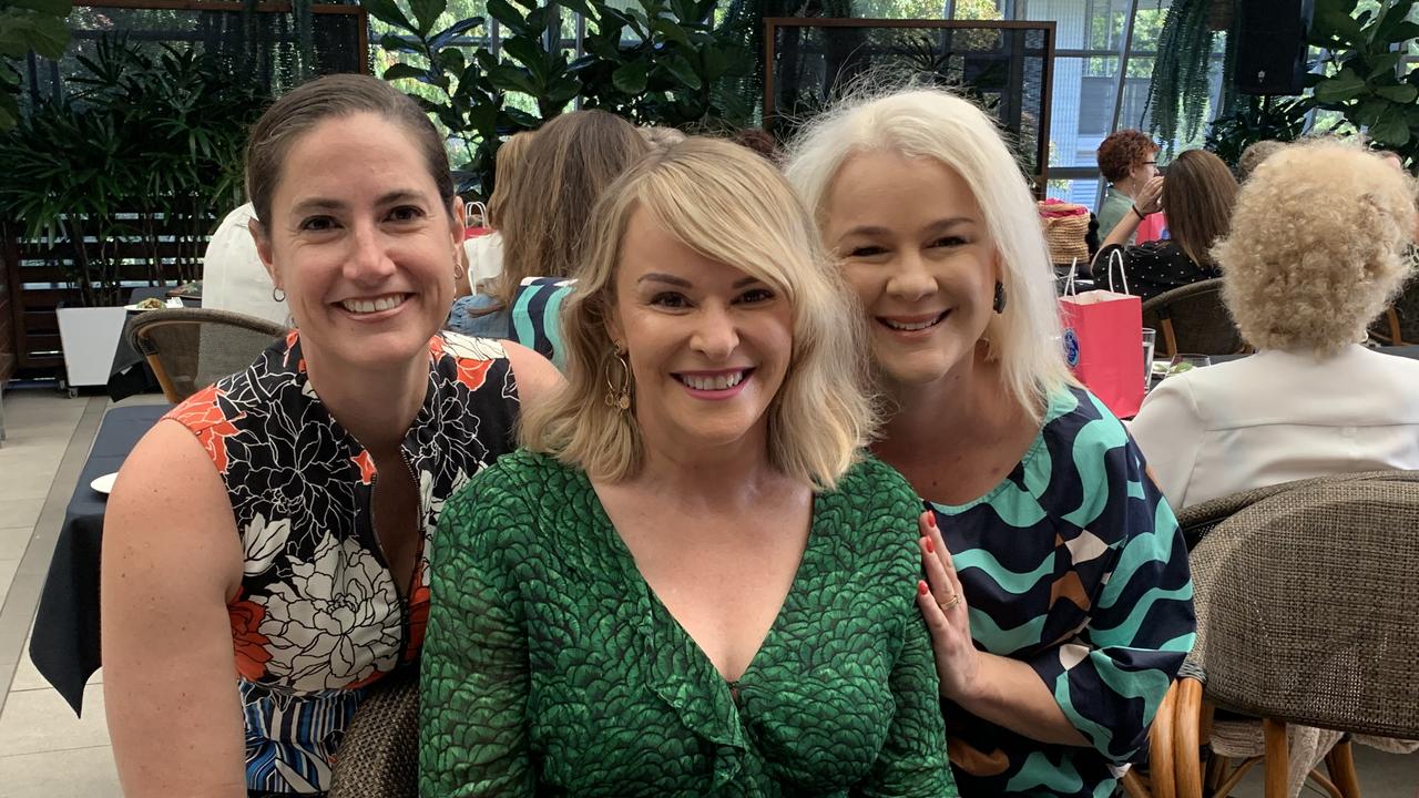 Leigh McCready, Melanie Anderson, and Kate Watson reconnect at the Mayor's Luncheon.