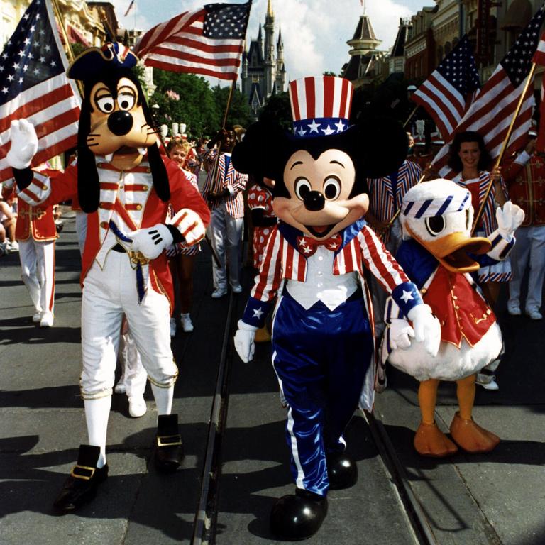 Mickey Mouse, Donald Duck and Goofy at Walt Disney World Magic Kingdom in Florida.