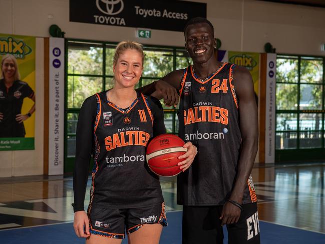 Darwin Salties Women's captain Ruby Porter and Men's captain Makuach Maluach ahead of the 2024 NBL1 North season. Picture: Pema Tamang Pakhrin.