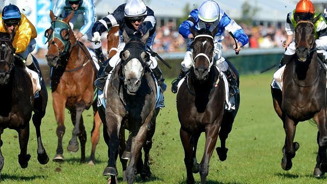 The Lloyd Williams-trained Fawkner, with Nicholas Hall on-board, wins the Caulfield Cup. Picture: Jay Town