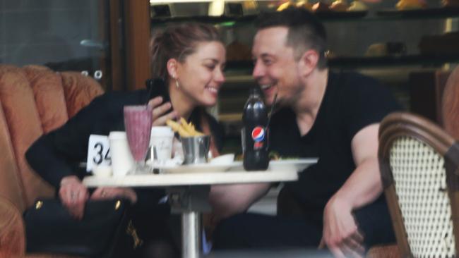 Amber Heard and Elon Musk at the Shingle Inn in Broadbeach. Picture: NIGEL HALLETT