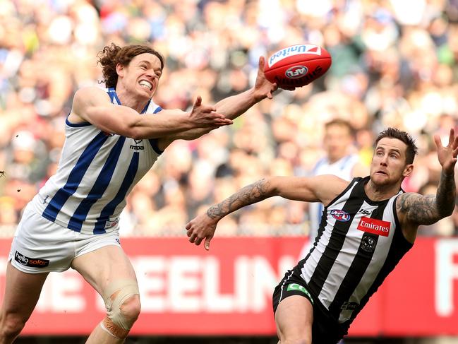 Ben Brown reaches for the ball in front of Jeremy Howe during the Round 18 match against Collingwood. Picture: AAP