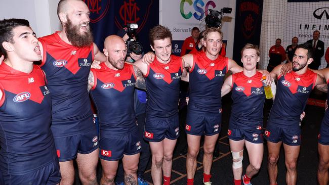 Demons players sing the team song after winning the Round 20 AFL match between the Melbourne Demons and the Gold Coast Suns at the MCG in Melbourne, Sunday, August 5, 2018. Pic: AAP