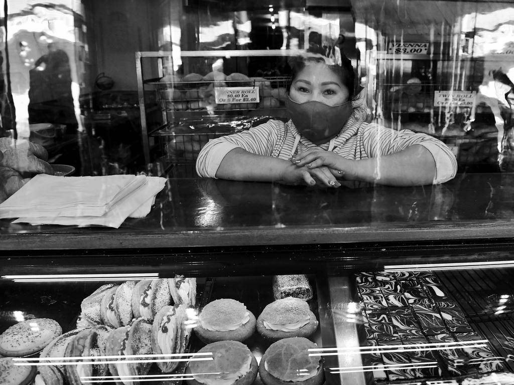 FACES OF LOCKDOWN: Jessica Lam, 48, of Fairfield working at the Guildford Hot Bakery. Photo: Jeremy Piper