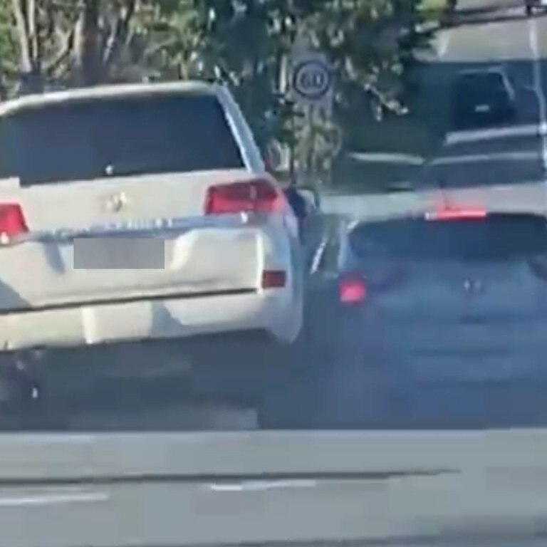 A stolen LandCruiser involved in a road rage incident moments before it hit and killed a couple walking their dog.