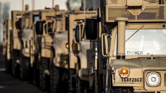 A US Army Humvee (front) and transport trucks on their way to Poland. Picture: AFP.