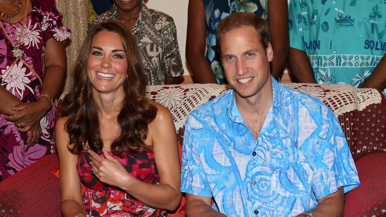 The happy duo pose in traditional island clothing in Honiara, Guadalcanal Island during their Diamond Jubilee tour of the Far East on September 16, 2012. Picture: Getty Images