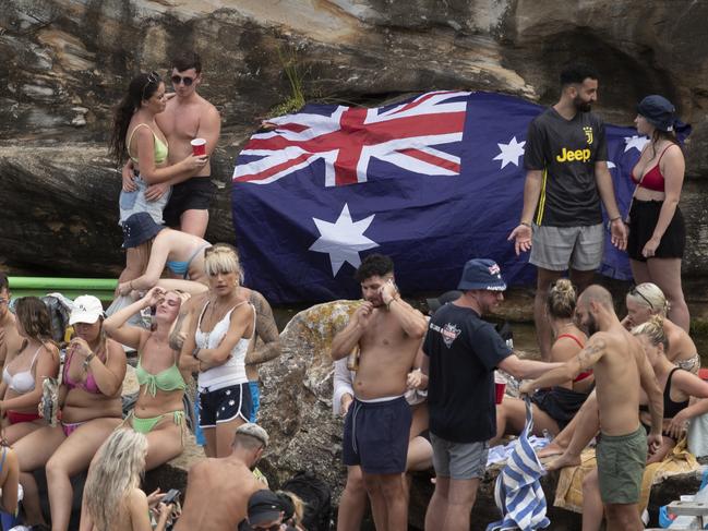 Australia Day revellers in Sydney’s Gordon Bay yesterday. Picture: Brook Mitchell/Getty Images