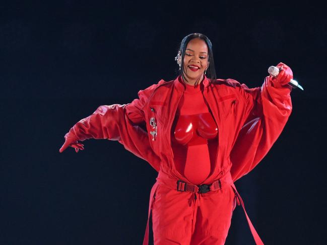 TOPSHOT - Barbadian singer Rihanna performs during the halftime show of Super Bowl LVII between the Kansas City Chiefs and the Philadelphia Eagles at State Farm Stadium in Glendale, Arizona, on February 12, 2023. (Photo by ANGELA WEISS / AFP)