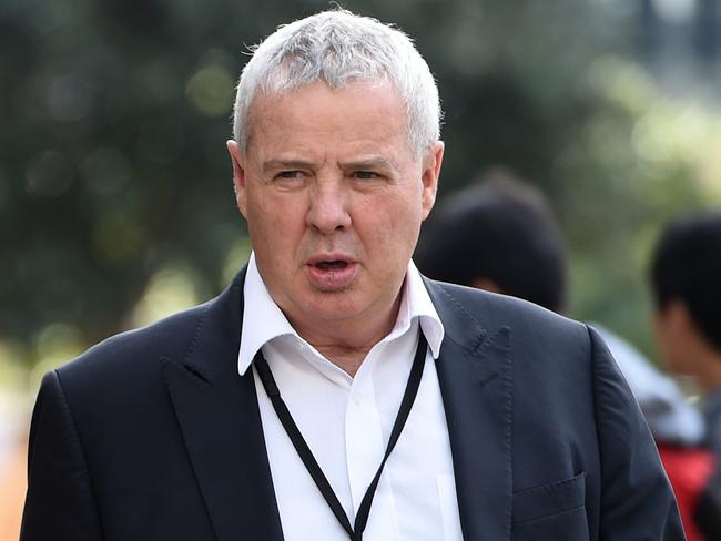 Australian Olympic Committee media Director Mike Tancred,  arrive to address the media in Sydney, Tuesday, June 21, 2016. Australian Paralympian Liesl Tesch and a team physiotherapist were robbed of their bicycles at gunpoint in Rio de Janeiro yesterday.  (AAP Image/Dan Himbrechts) NO ARCHIVING