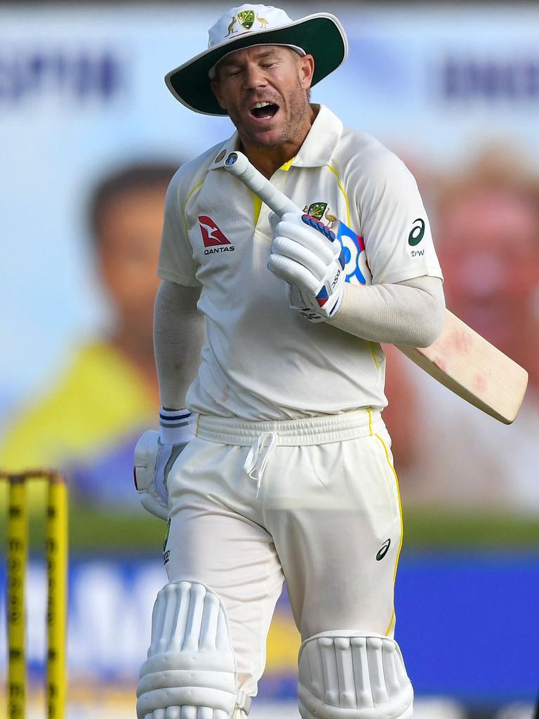 Warner remonstrates with himself as he walks back to the pavilion. Picture: Ishara S. Kodikara/AFP