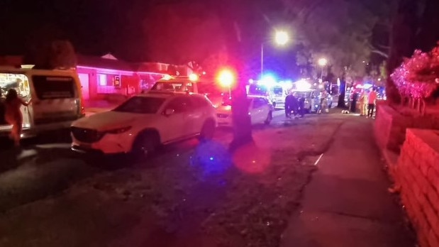 Police and fire crews and paramedics at the scene of the blast in Mill Park on New Year’s Eve. Picture: Regan Hodge