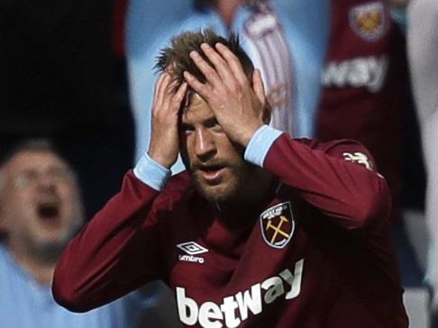 West Ham's Andriy Yarmolenko reacts after missing a chance to score during the English Premier League soccer match between West Ham United and Chelsea at London Stadium in London, Sunday, Sept. 23, 2018. (AP Photo/Matt Dunham)