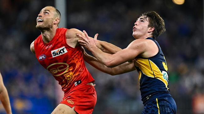 Jarrod Witts (left) battles against West Coast’s Jack Williams. (Photo by Daniel Carson/AFL Photos via Getty Images)