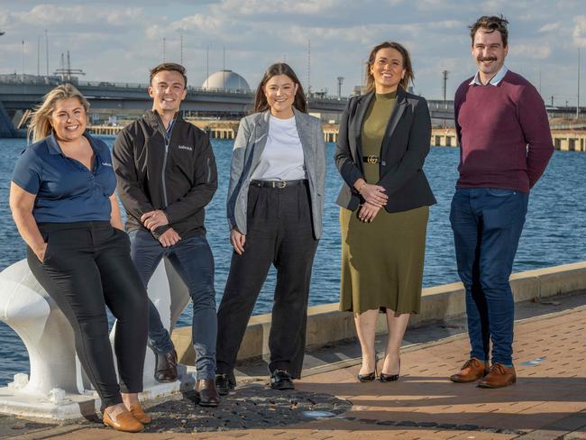 Babcock workers beyond engineers at Port river overlooking Port Adelaide SA (L-R) Melanie Ryan, Mark Jenkin, Adrienne Goode, Kerry-Anne Palzewski and Patrick Ronai. Pictured on May 9th 2024. Picture: Ben Clark