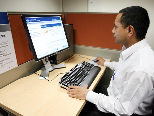 A migrant sitting the citizenship test in Australia. Picture: News Corp Australia