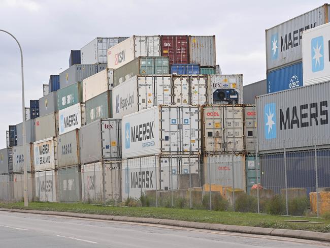 Mr Kellett used a grapling hook to scale a tower of shipping containers. Picture: Keryn Stevens