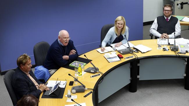 One of the final meetings of Glenorchy City Council Stuart Slade, left, Harry Quick and Kristie Johnston and Peter Brooks