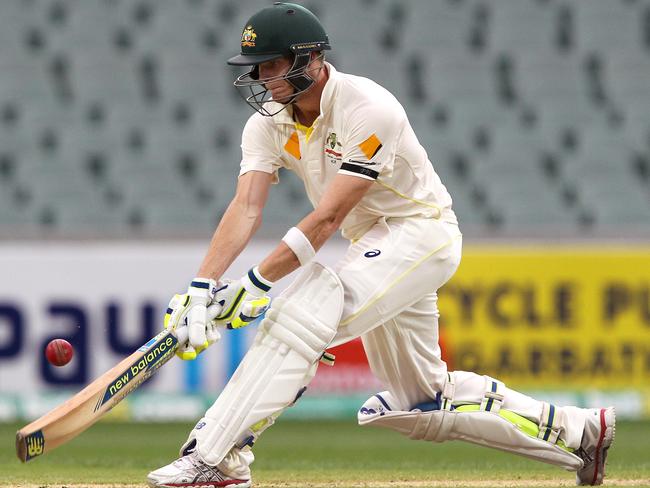 Australia's Steve Smith plays a reverse sweep during his century innings against India. AP Photo/James Elsby