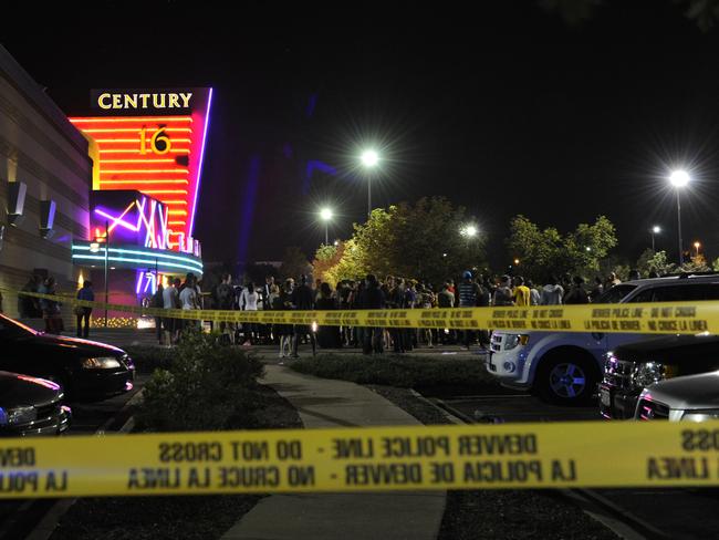 People gather outside the Century 16 cinema in Aurora, Colorado, after the mass shooting on July 20, 2012. Picture: Karl Gehring