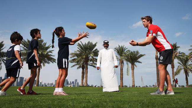 Callum Mills meets Eisan Ahmed Abdulla and his children Dana, Khalifa and Nasser who play for the Doha Kangaroos. Picture: Phil Hillyard