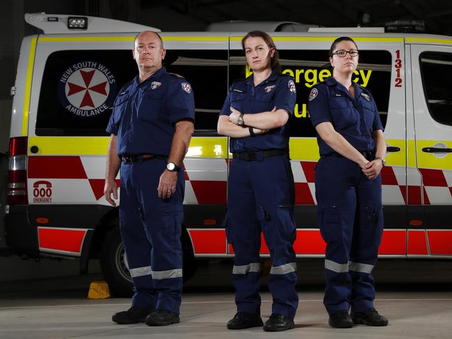 Embargoed for The Daily Telegraph Monday 23/11/20NSW paramedics Craig Hall, Corinne Keefe and Amy Neal (right) who were fist on the scene for the Oatlands crash. Pictured at the Northmead Ambulance station. Picture: Jonathan Ng