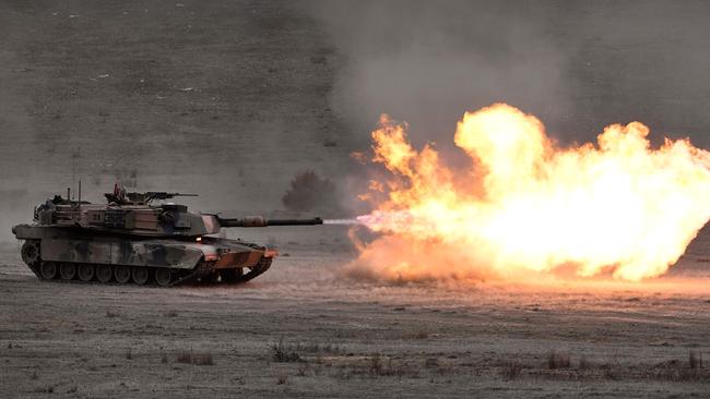 An Australian army M1A1 Abrams main battle tank fires a round at a target during Exercise Chong Ju, a live-fire demonstration at the Puckapunyal Military Base in Victoria. Picture: AFP