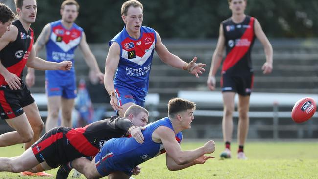 Star Bulldogs midfielder Harry Grant fires out a handpass against West Adelaide at Richmond Oval. Picture: David Mariuz/SANFL