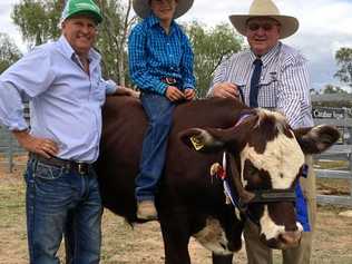 WINNING PET: Mitchell Show Society president Steve Hancock with pet parade winners Cooper Campbell and Squeaky, alongside Wayne Crompton. Picture: Mitchell Show