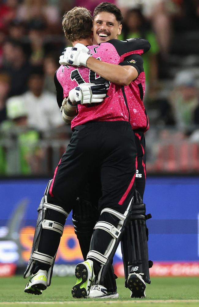 Ben Dwarshuis celebrates with Jordan Silk as the Sixers beat the Thunder. Picture: Getty Images