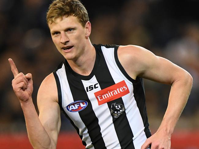 **RETRANSMISSION CAPTION CORRECTION** Will Hoskin-Elliott of the Magpies reacts after kicking a goal during the Second Semi Final between the Collingwood Magpies and the Greater Western Sydney (GWS) Giants in Week 2 of the AFL Finals Series at the MCG in Melbourne, Saturday, September 15, 2018. (AAP Image/Julian Smith) NO ARCHIVING, EDITORIAL USE ONLY