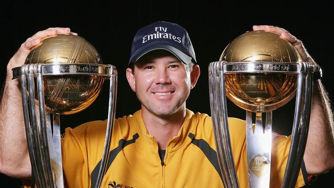 Ricky Ponting of Australia poses with the 1999 and 2003 World Cup trophies.