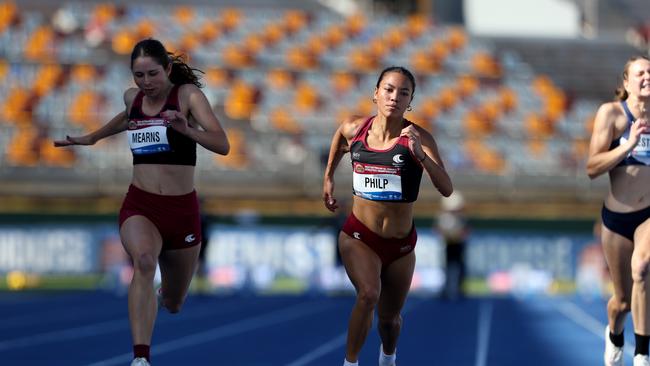 Queenslands Thewbelle Philp on her way to a record 11.38 seconds in the 100m. Picture David Clark