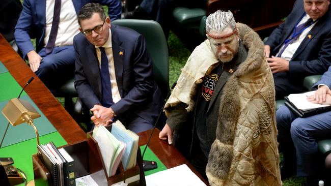 Marcus Stewart, Co-chair of the First Peoples' Assembly, addresses the Victorian Parliament Legislative Assembly, watched on by Victorian Premier Daniel Andrews.