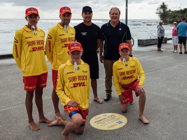 Joel Parkinson alongside local surf lifesavers at the unveiling of the 'Walk of Fame'