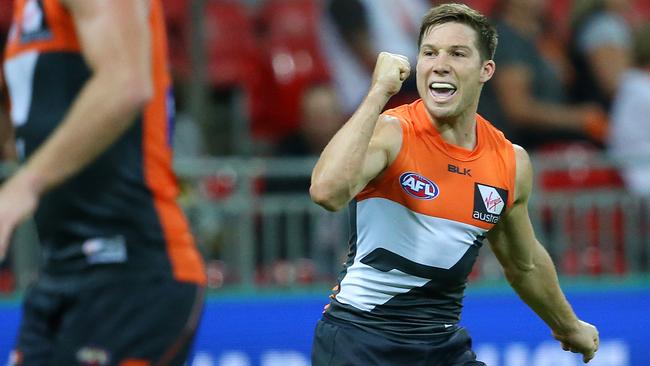 Toby Greene celebrates a goal against Hawthorn.