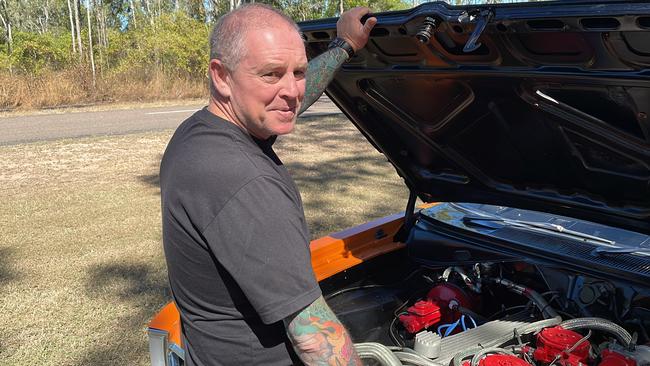 Townsville man Troy Wilson showcases what's under the hood of his 1971 Valiant Charger.