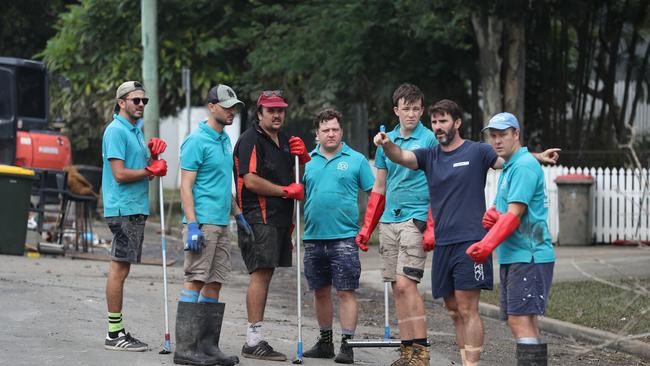 Cleaning up in Vincent St, Auchenflower. Picture: Annette Dew