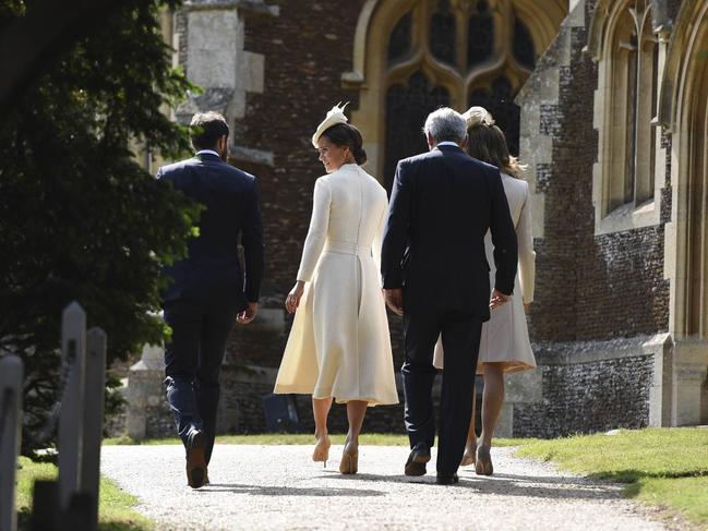 The Middleton family from left, James and Pippa and parents Michael and Carole, arrive at the Church of St Mary Magdalene on the Sandringham Estate, England, for the christening of Princess Charlotte, Sunday, July 5, 2015. Picture: AP