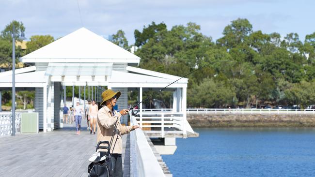 A spot of fishing - and walking - at Shorncliffe Pier. Picture: Renae Droop