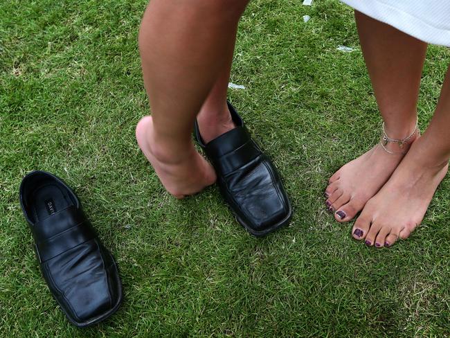 Melbourne Cup Day 2014 at Flemington Racecourse. Punters start to get a little raucous after the cup. Picture: Mark Stewart