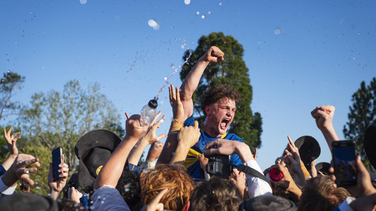 Grammar First XV captain Joe Gray is lifted in celebration of winning the O'Callaghan Cup on Grammar Downlands Day hosted by Downlands College, Saturday, August 31, 2024. Picture: Kevin Farmer