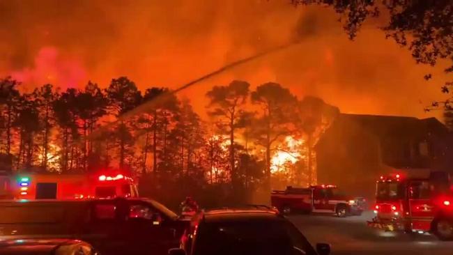 ‘Wall of Fire’ Bears Down on Homes as Raging Inferno Turns Sky Orange