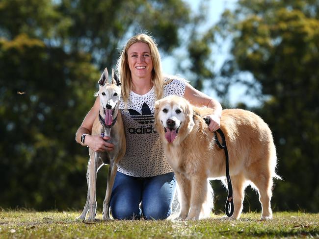 Sally Pearson with her dogs Oscar and Kayla (Greyhound). Pics Adam Head