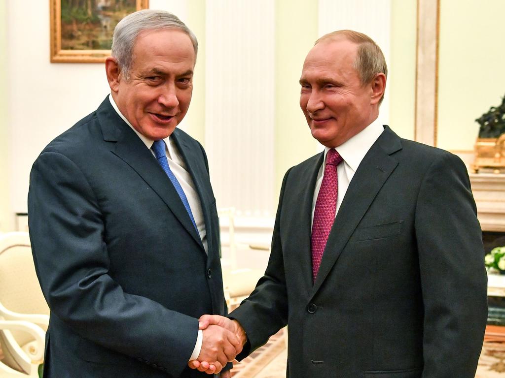 Russian President Vladimir Putin shakes hands with Israeli Prime Minister Benjamin Netanyahu during a meeting at the Kremlin in Moscow in July. Picture: AFP