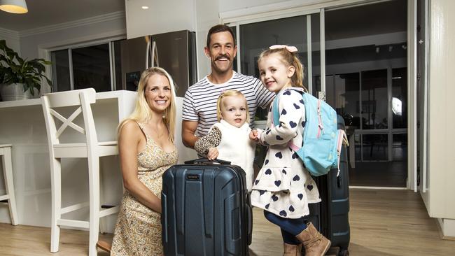 Samantha Porter, with her husband Julian and daughters Lucette, 4, and Sienna, 2, knows the importance of domestic tourism to the Australian economy. Picture: Nigel Hallett