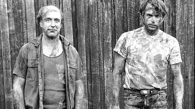 Cult hit ... Actors John Clarke (left) and Sam Neill in the 1991 film adaptation of Death in Brunswick. Picture: Entertainmen...