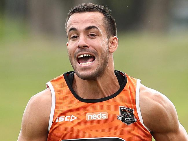 Corey Thompson and Michael Chee Kam during Wests Tigers training at Concord oval. Picture. Phil Hillyard