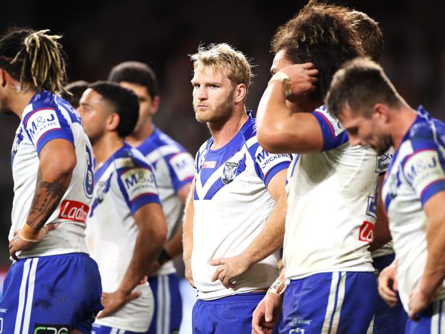 SYDNEY, AUSTRALIA - JUNE 28: Aiden Tolman of the Bulldogs and his team mates look dejected after a Tigers try during the round seven NRL match between the Canterbury Bulldogs and the Wests Tigers at Bankwest Stadium on June 28, 2020 in Sydney, Australia. (Photo by Mark Kolbe/Getty Images)